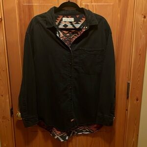 Free people black button down shirt with design on back. Size S